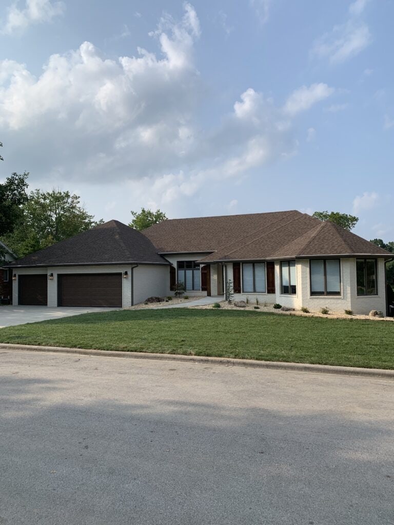 Custom home with spacious design and elegant exterior.