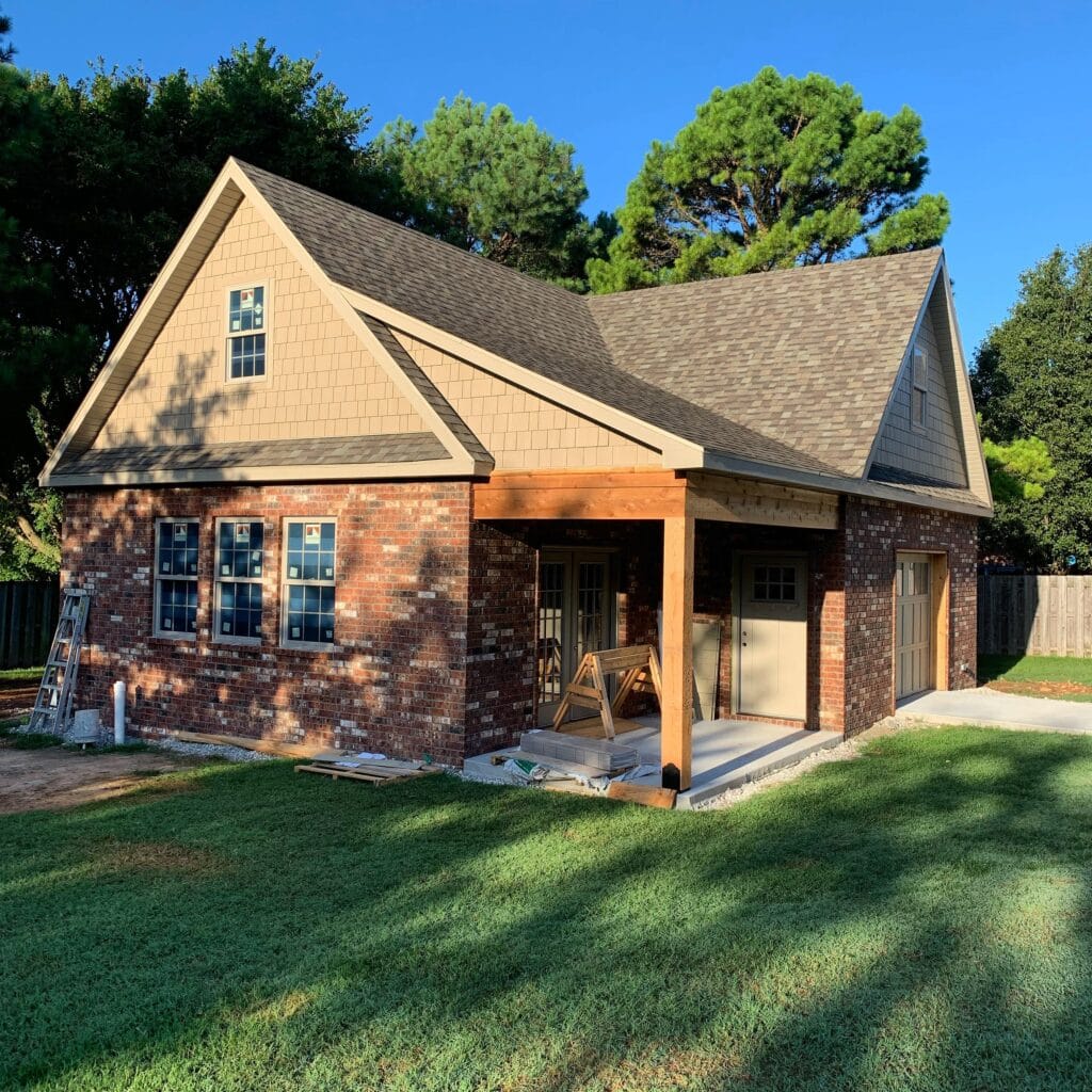 Custom home built by Copper Creek Builders with brick and siding exterior.